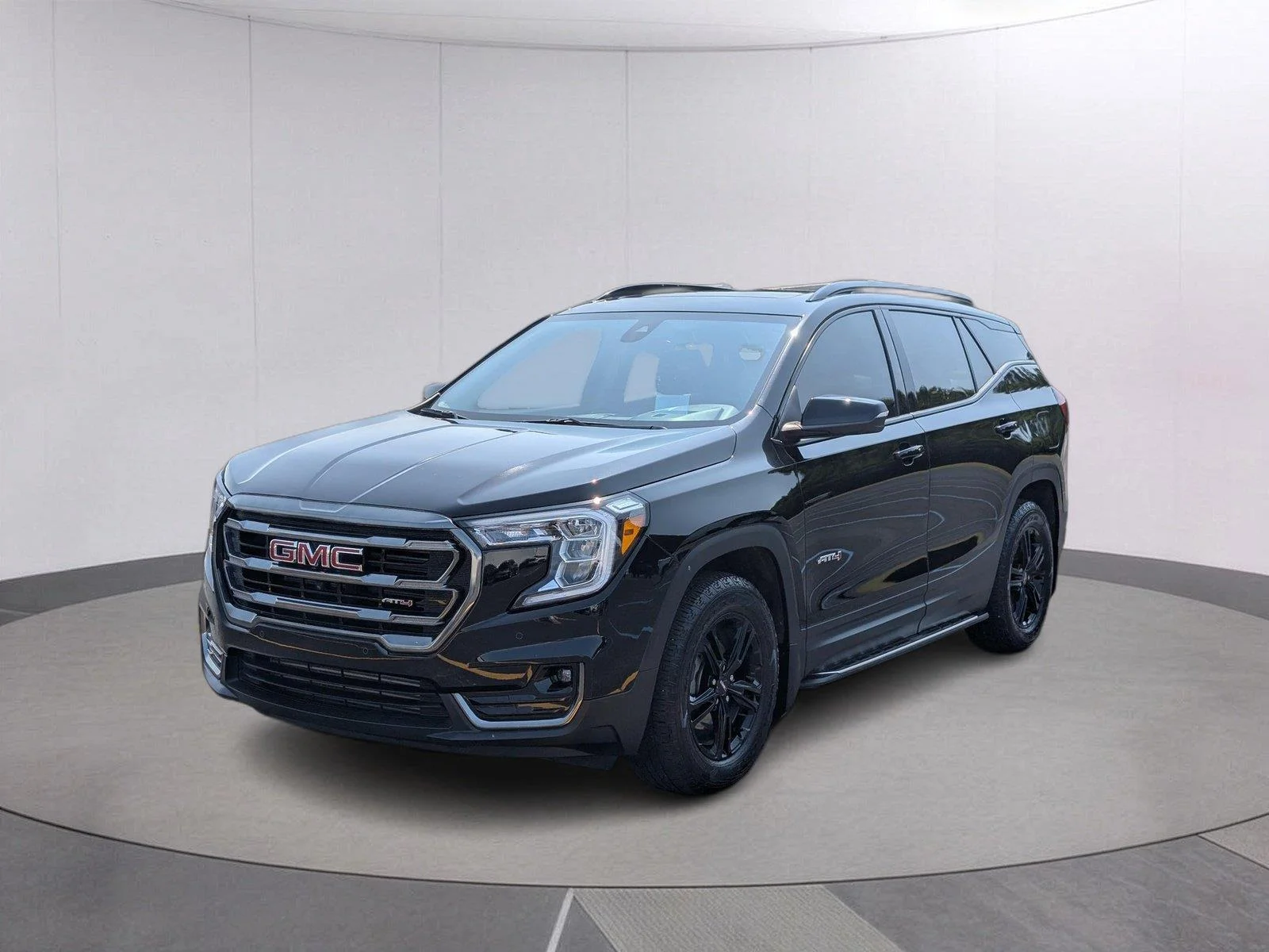 Used 2023 EBONY TWILIGHT METALLIC GMC AT4 image 1