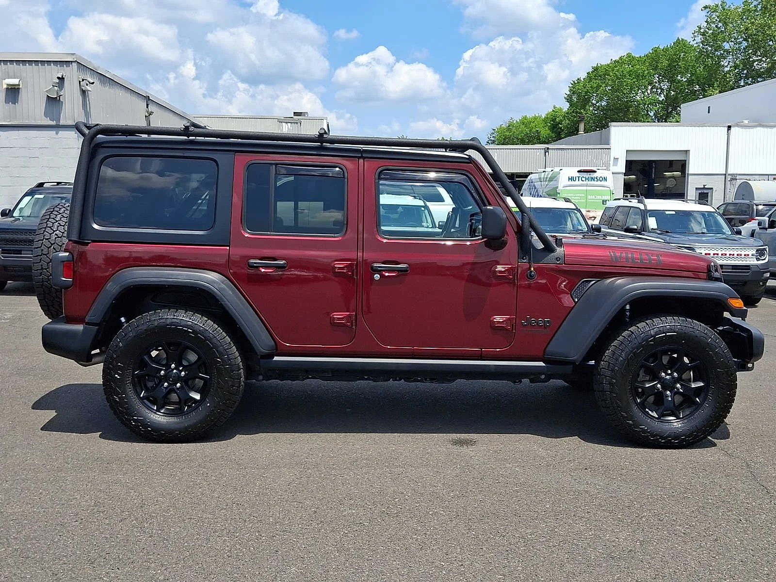 Used 2021 Snazzberry Pearlcoat Jeep Unlimited Willys image 7