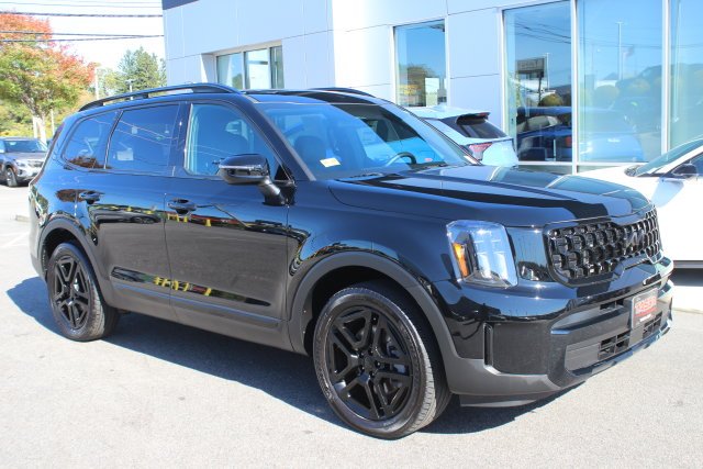 Used 2025 Black Kia EX X-Line image 1