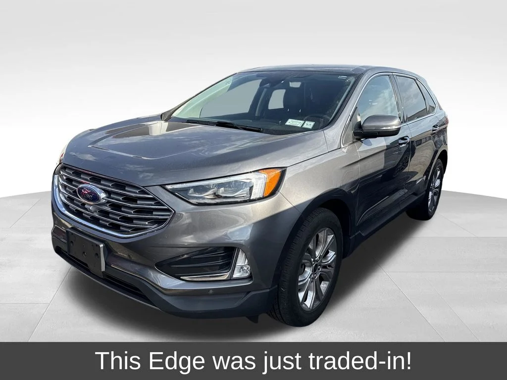 Certified Used 2023 Gray Metallic Ford Titanium image 1