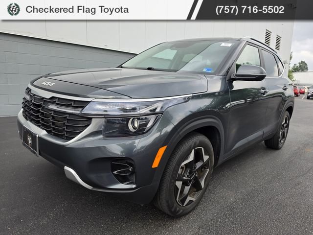 Used 2024 Gravity Gray Kia EX image 1