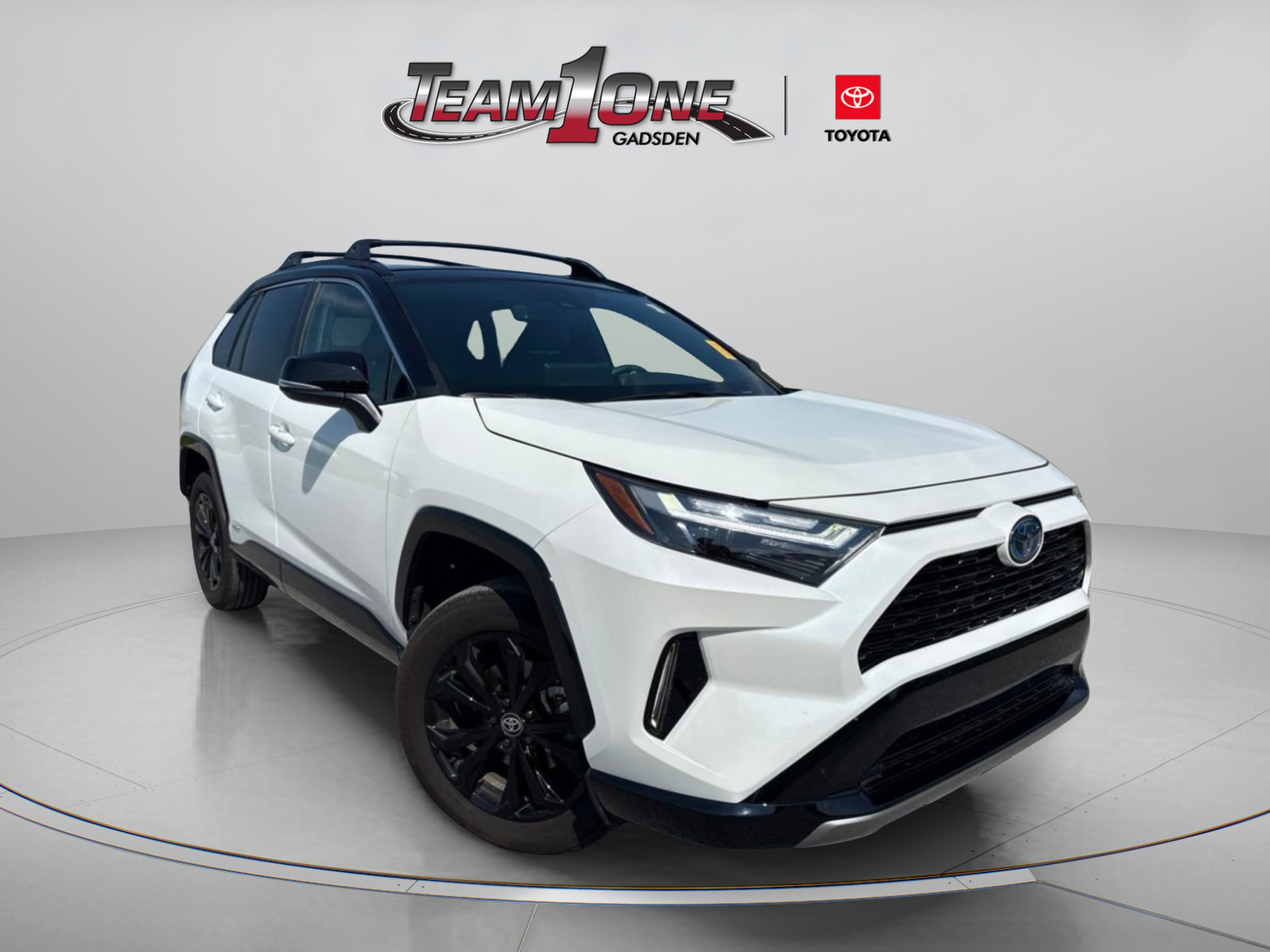 Used 2023 Midnight Black Metallic Toyota Hybrid XSE image 1