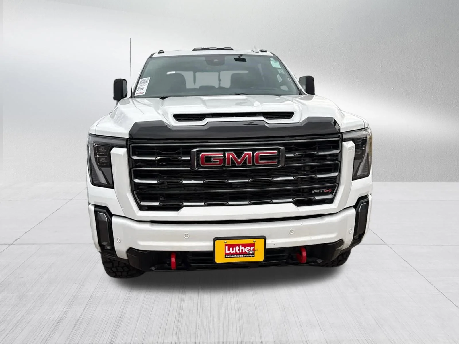 Used 2024 GMC Sierra 3500HD AT4 with VIN 1GT49VEY0RF402906 for sale in Brooklyn Center, Minnesota
