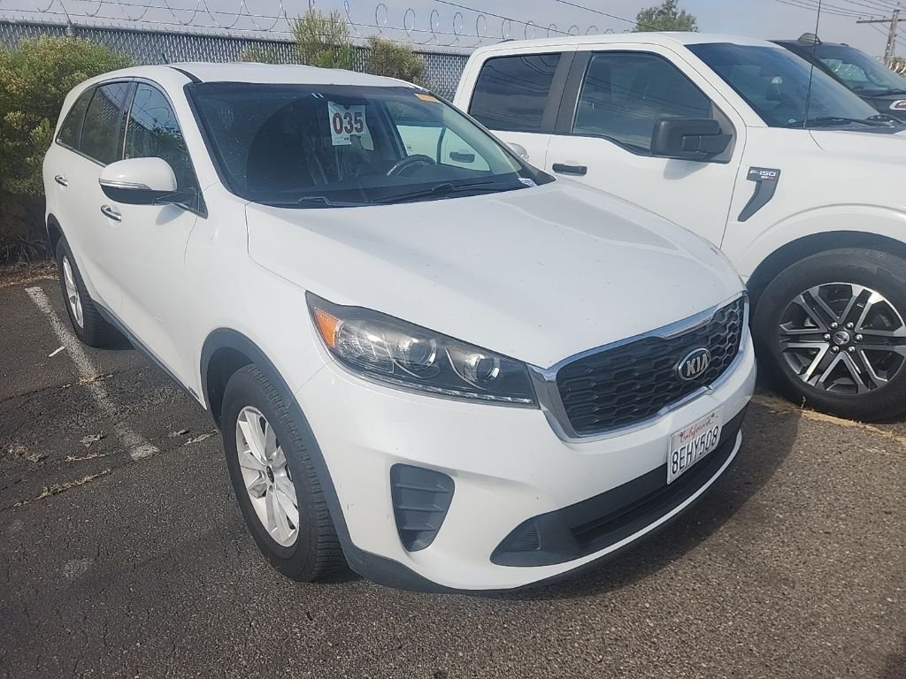 Used 2019 White Kia LX image 1