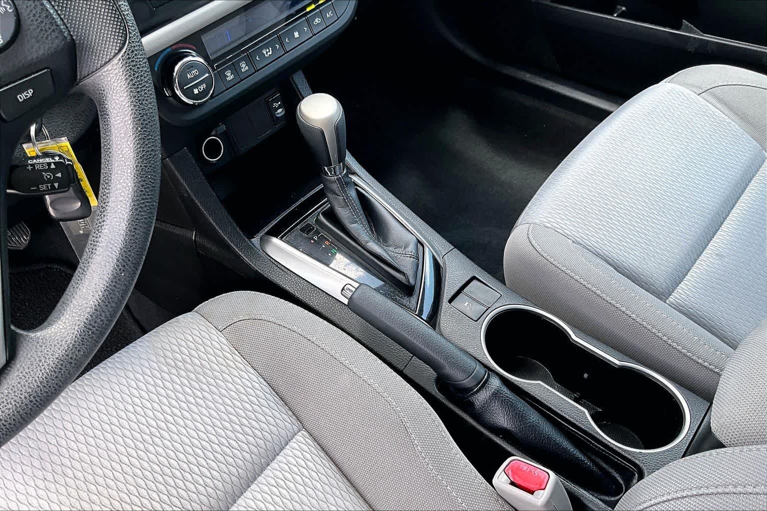 Used 2016 Classic Silver Metallic Toyota LE image 16