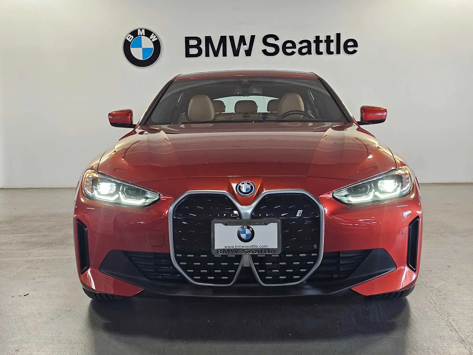 Certified Used 2023 Sunset Orange Metallic BMW eDrive35 image 6