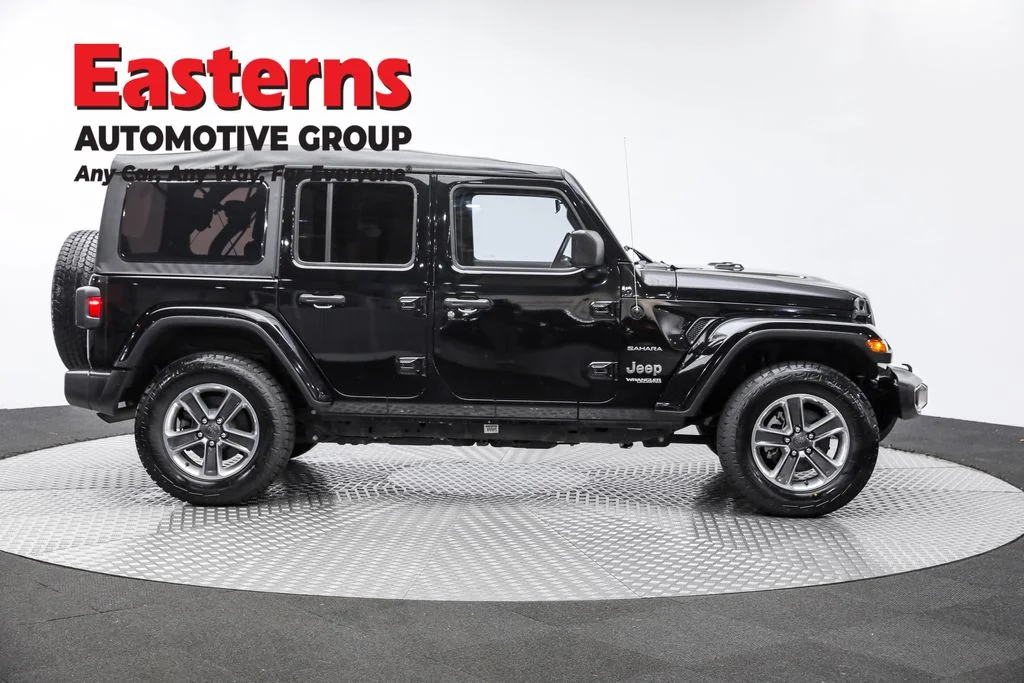Used 2021 Black Jeep Unlimited Sahara image 4