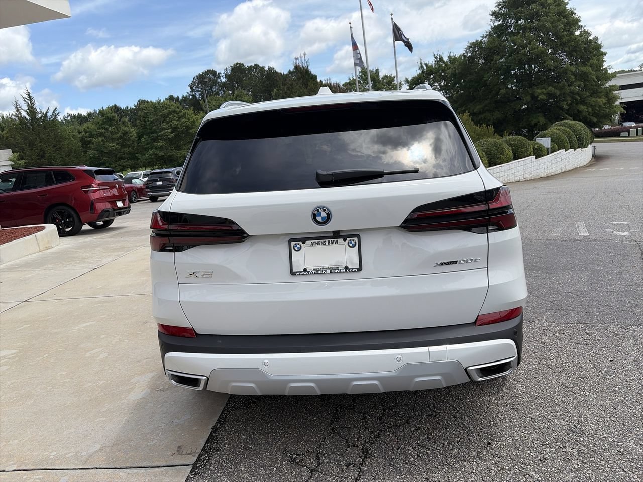New 2026 Alpine White BMW xDrive50e image 7