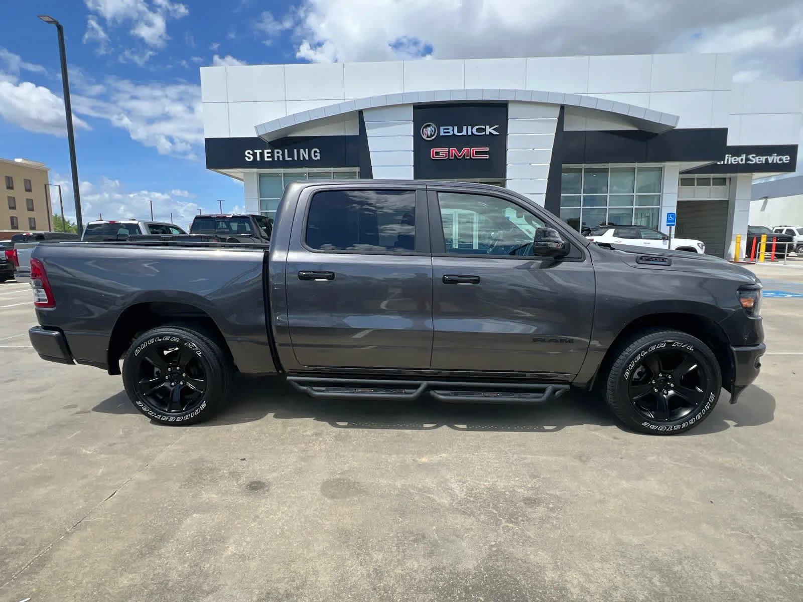 2024 RAM 1500 Big Horn/Lone Star 4x4 Crew Cab 5'7's photo