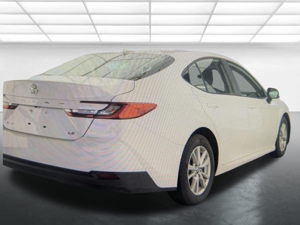 Used 2025 Black Toyota LE image 2