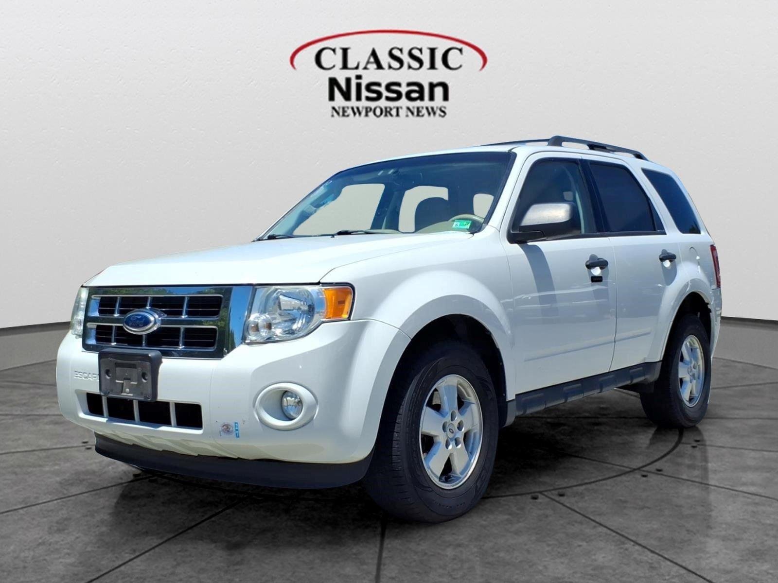 Used 2012 White Suede Ford XLT image 1