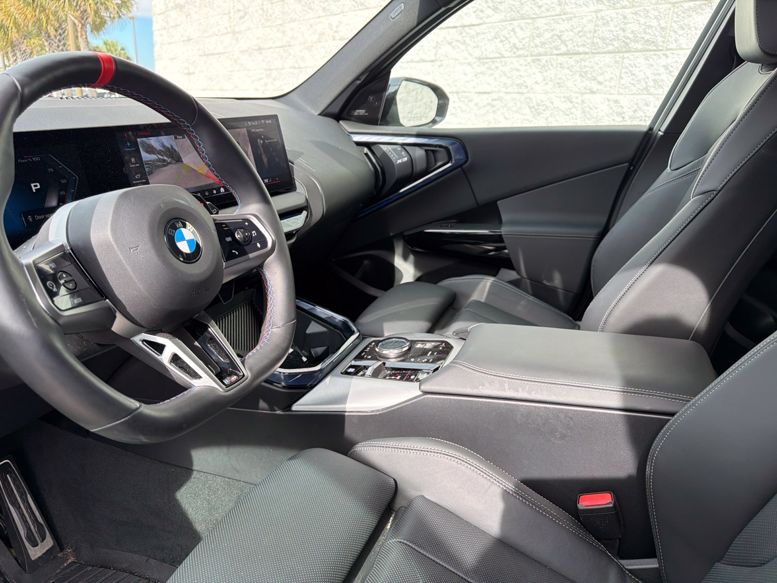 Used 2025 Black Sapphire Metallic BMW M50 xDrive image 2