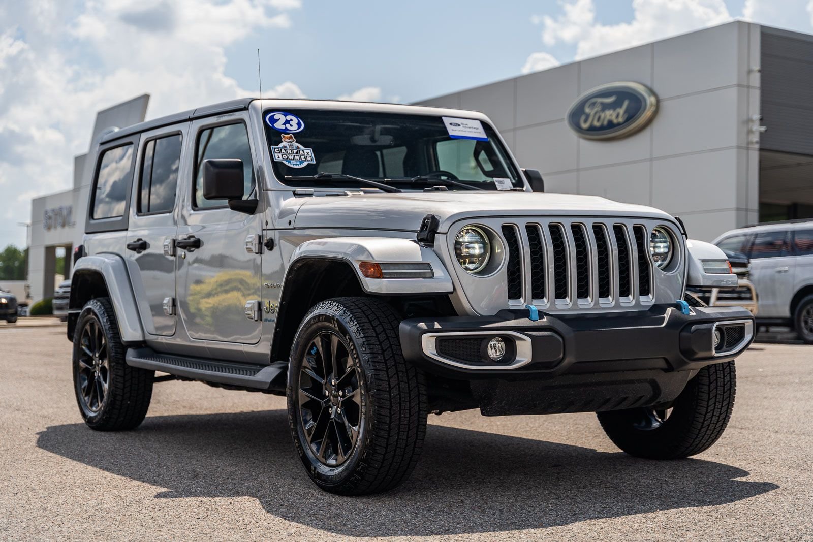 Certified Used 2023 Silver Jeep Sahara 4xe image 1