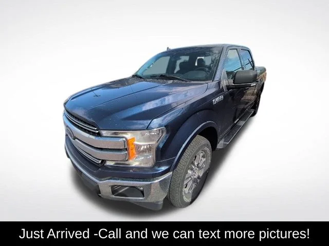 Used 2020 Blue Ford Lariat image 1