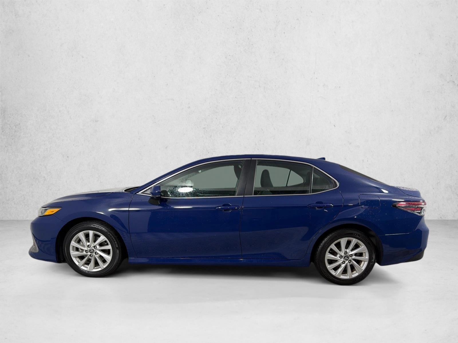 Used 2024 Reservoir Blue Toyota LE image 6