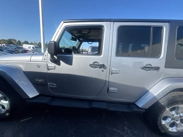 Used 2013 Silver Jeep Unlimited Sahara image 2