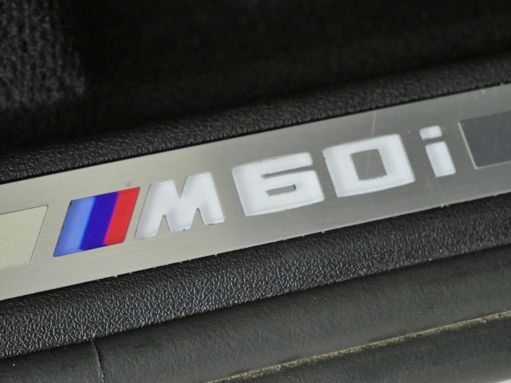 Certified Used 2024 Mineral White Metallic BMW M60i image 28