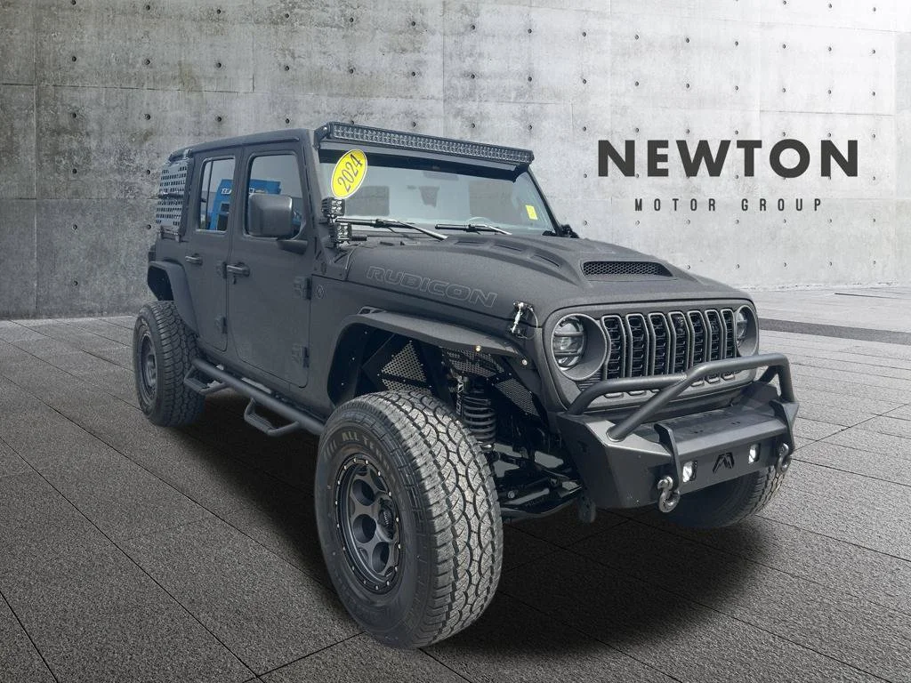 Used 2024 Black Jeep Rubicon image 1