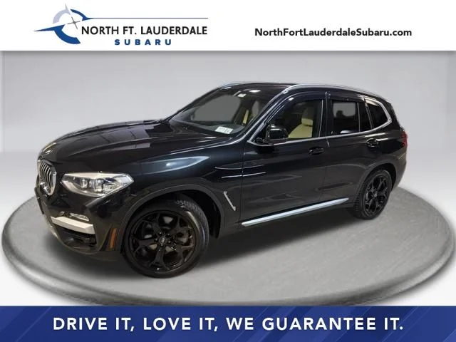 Used 2019 Black BMW sDrive30i image 1