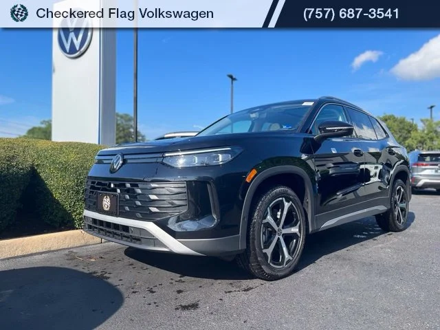 New 2026 Black Volkswagen SE image 1