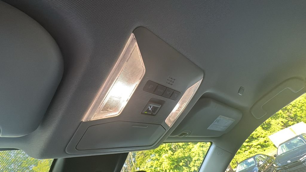Used 2025 Magnetic Gray Metallic Toyota LE image 24