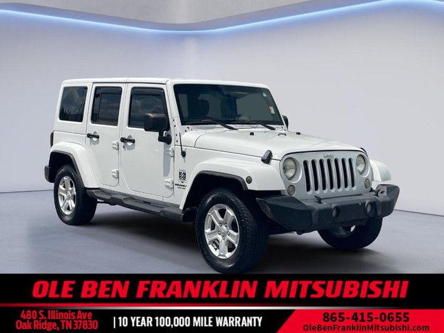 Pre-Owned 2012 Jeep Wrangler Sahara 4WD Sport Utility