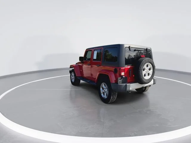 Used 2014 Red Jeep Unlimited Sahara image 8