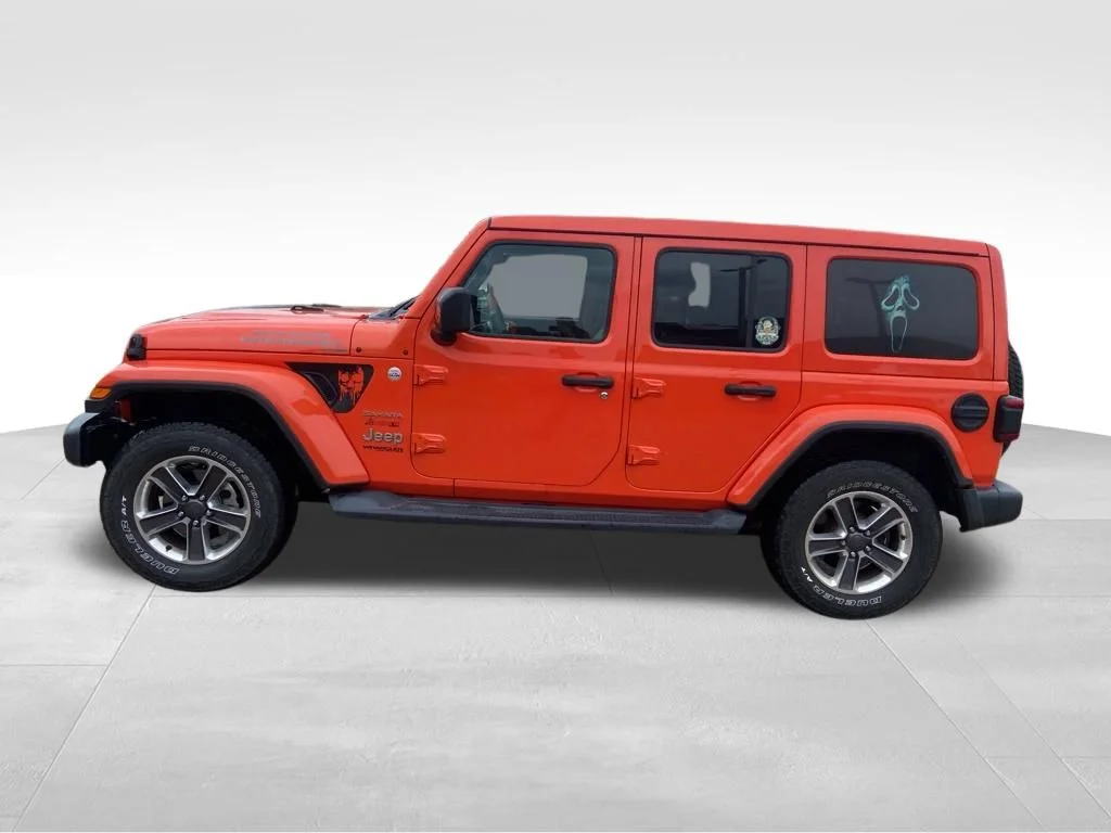 Used 2019 Orange Jeep Unlimited Sahara image 21