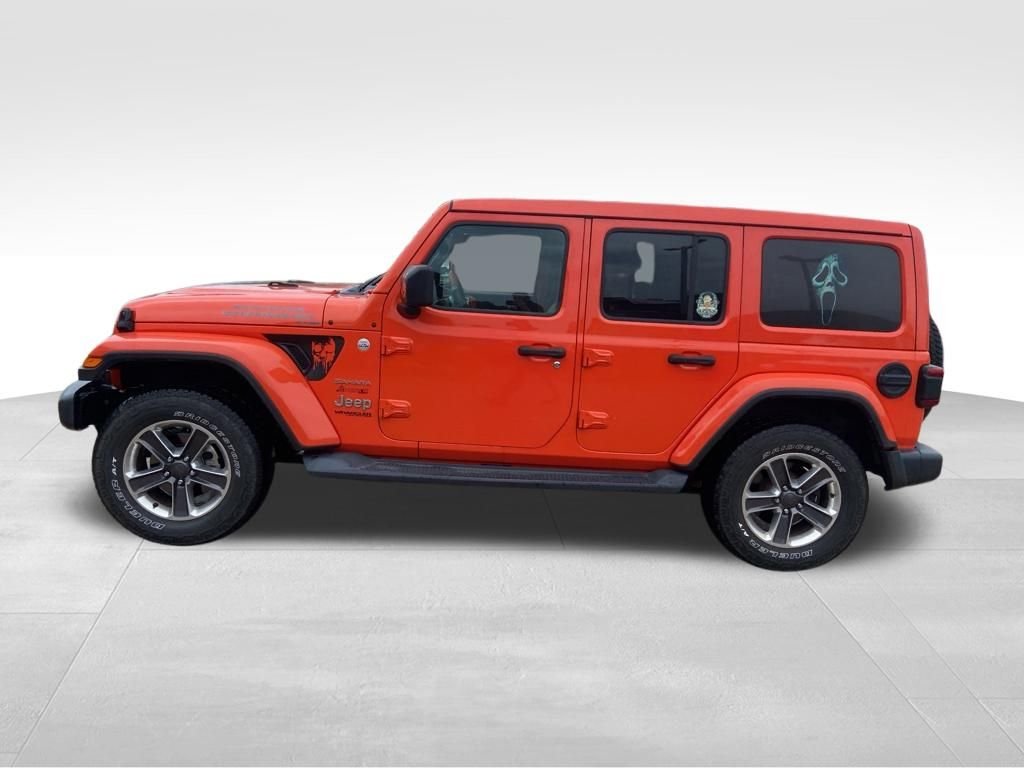 Used 2019 Orange Jeep Unlimited Sahara image 21