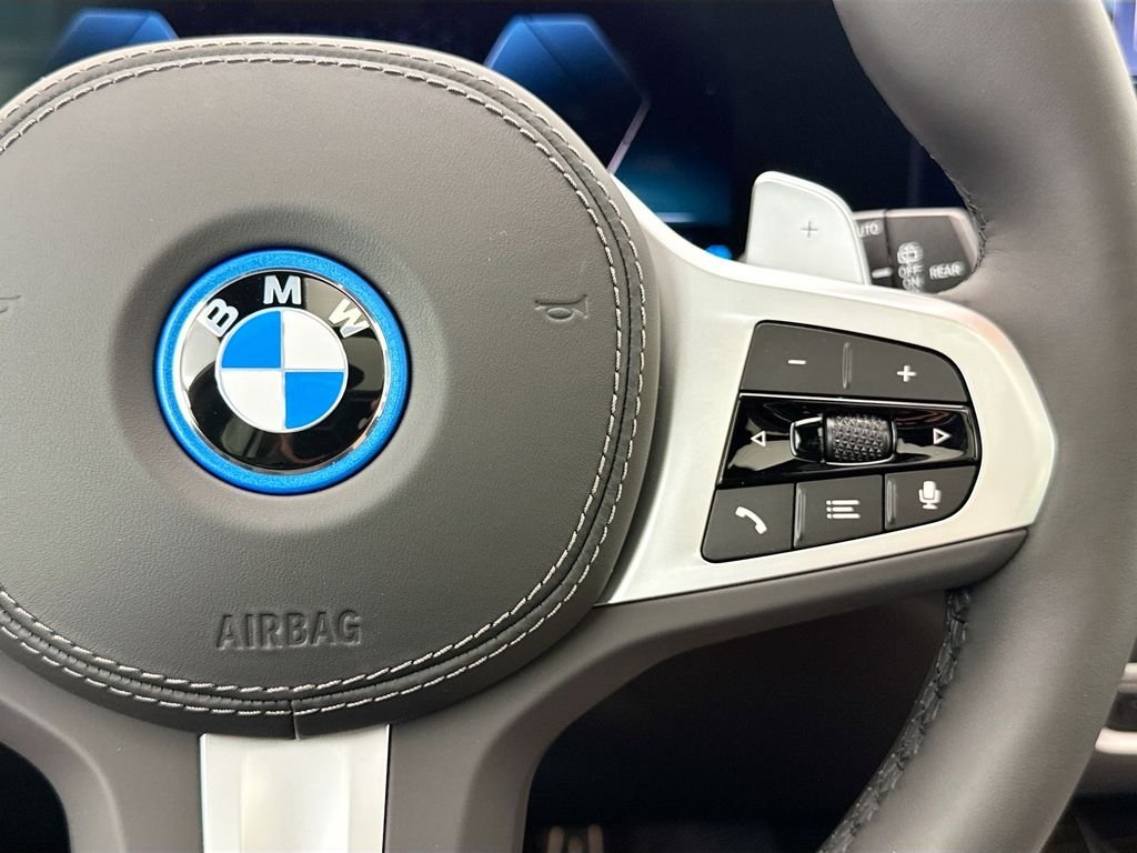 New 2026 Black Sapphire Metallic BMW xDrive50e image 12