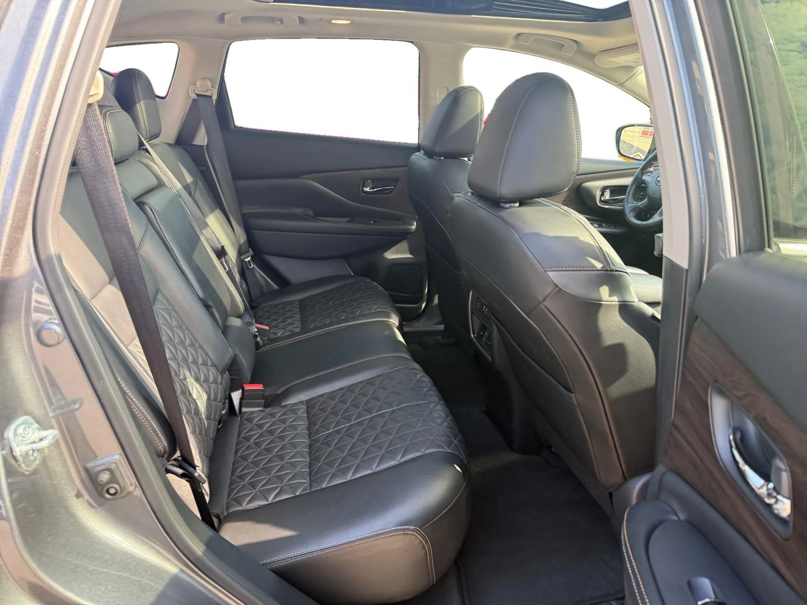 Used 2024 Super Black Nissan Platinum image 25