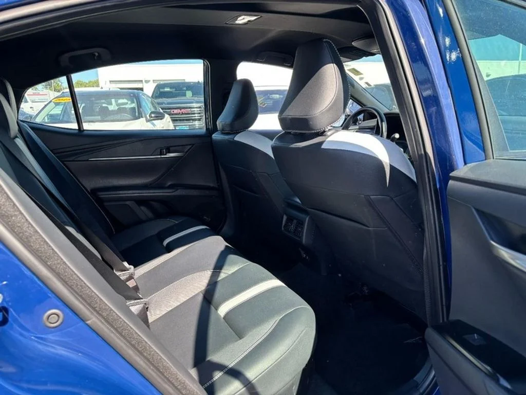 Used 2025 Reservoir Blue Toyota SE image 13