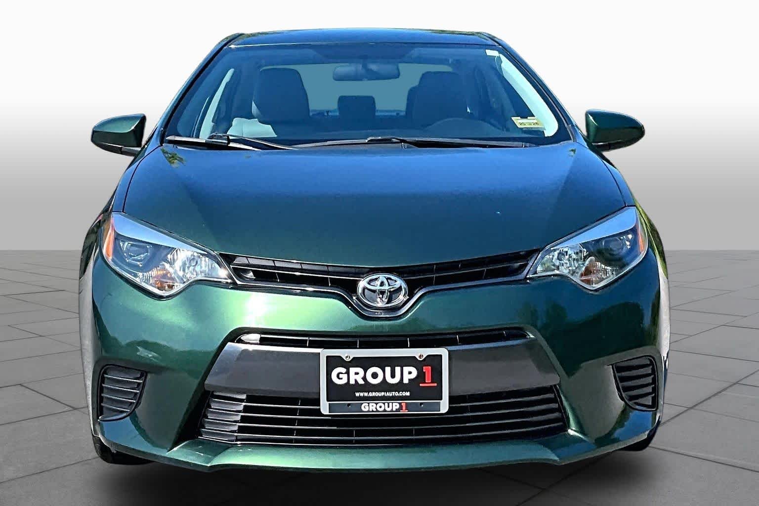 Used 2016 4Evergreen Metallic Toyota LE image 4
