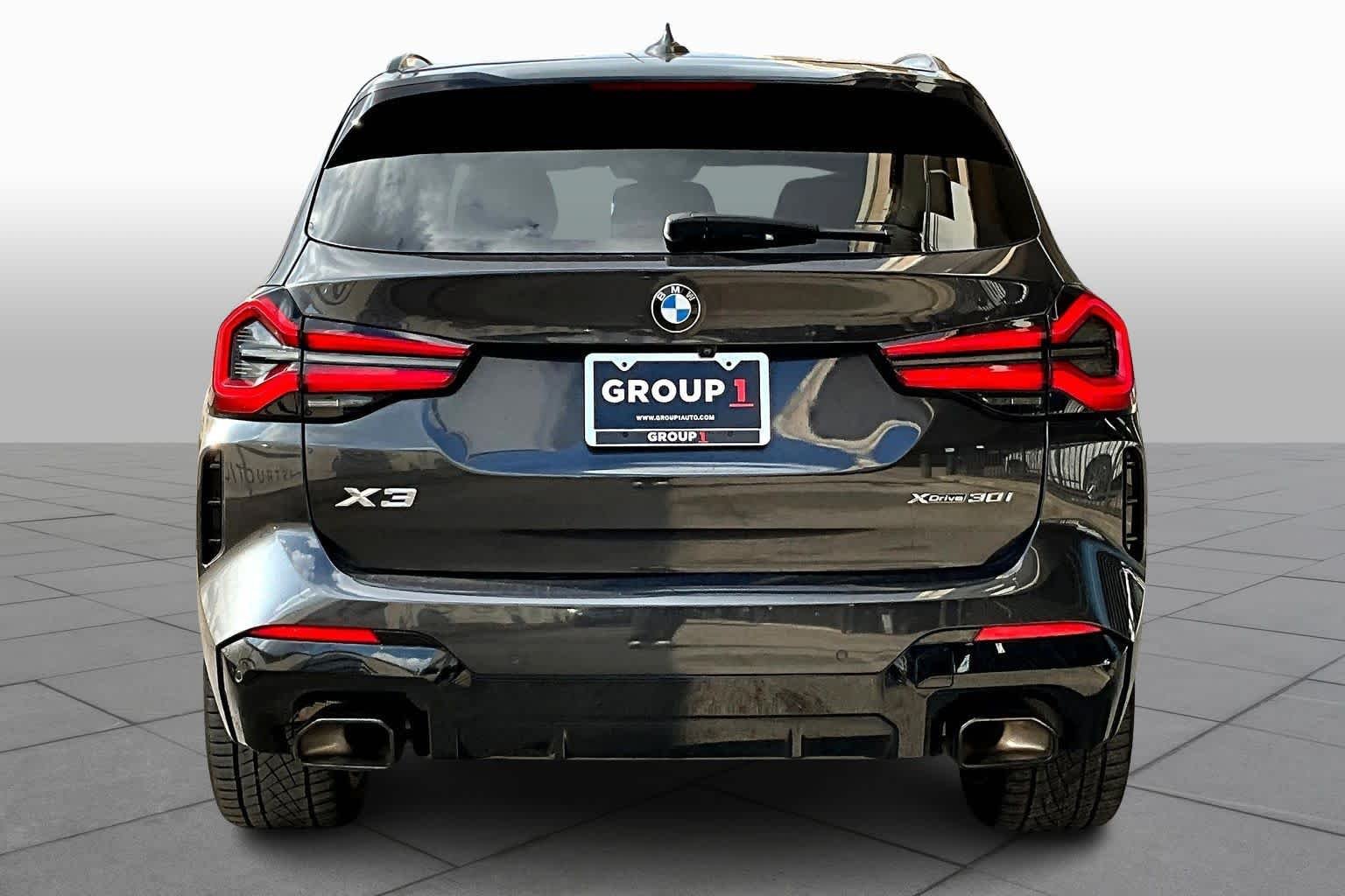 Used 2024 Dark Graphite Metallic BMW xDrive30i image 4