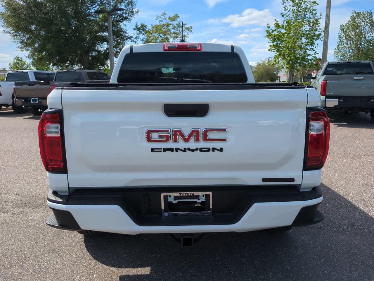 Used 2024 Summit White GMC 2WD Elevation image 5