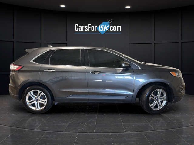 Used 2015 Magnetic Metallic Ford Titanium image 8