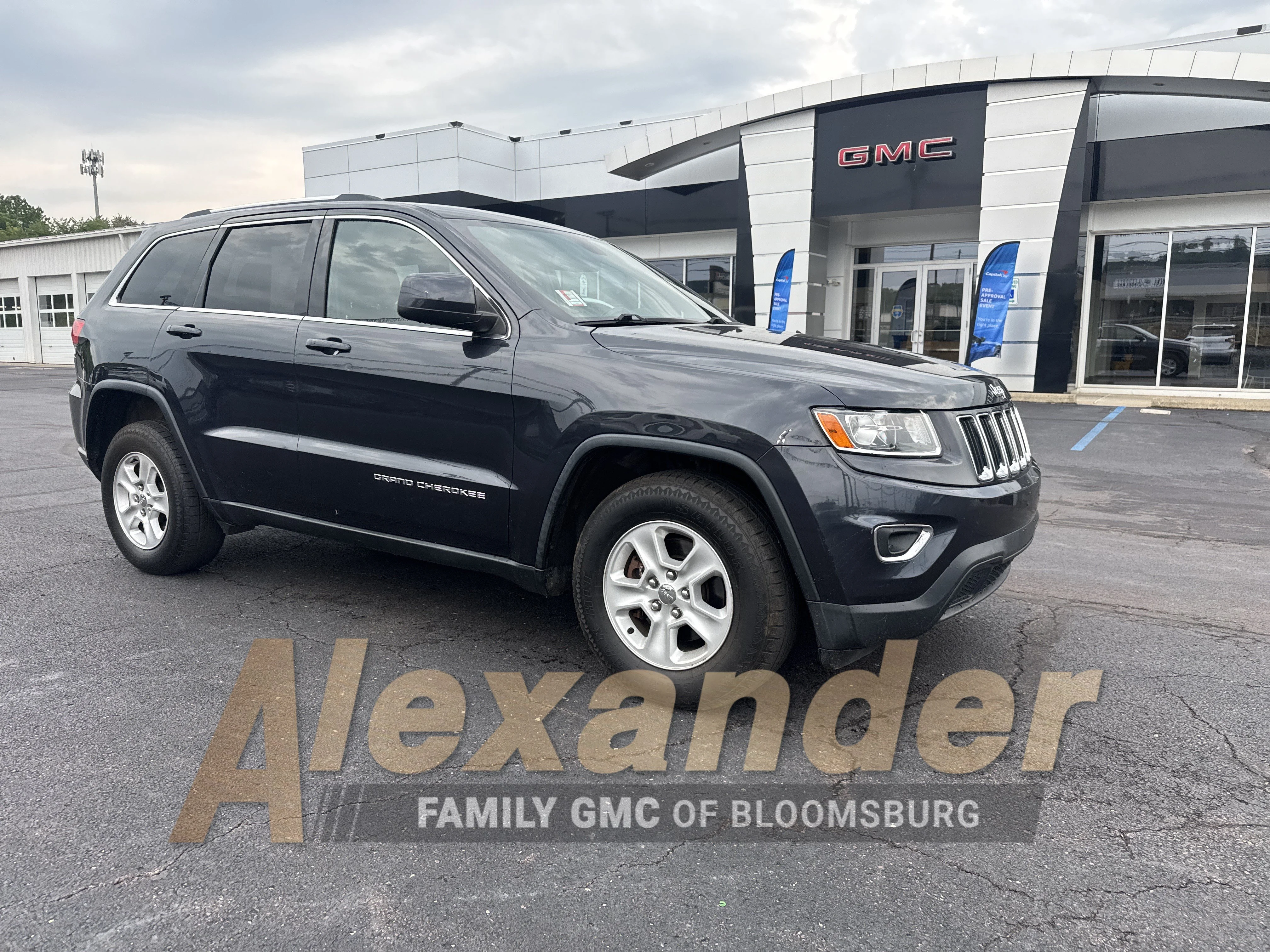 Used 2014 Maximum Steel Metallic Clearcoat Jeep Laredo image 1