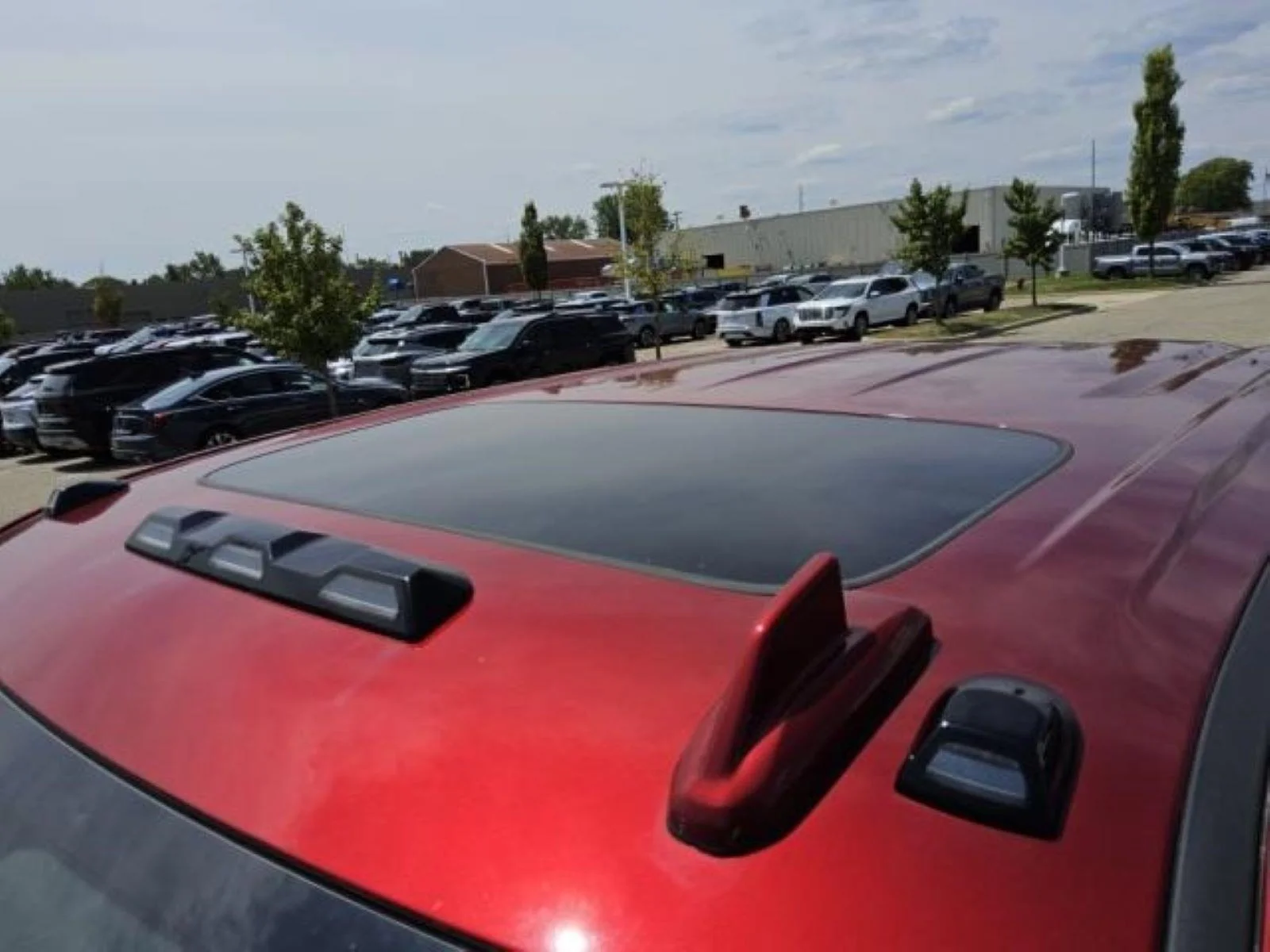 Used 2026 Volcanic Red Tintcoat GMC AT4X image 9