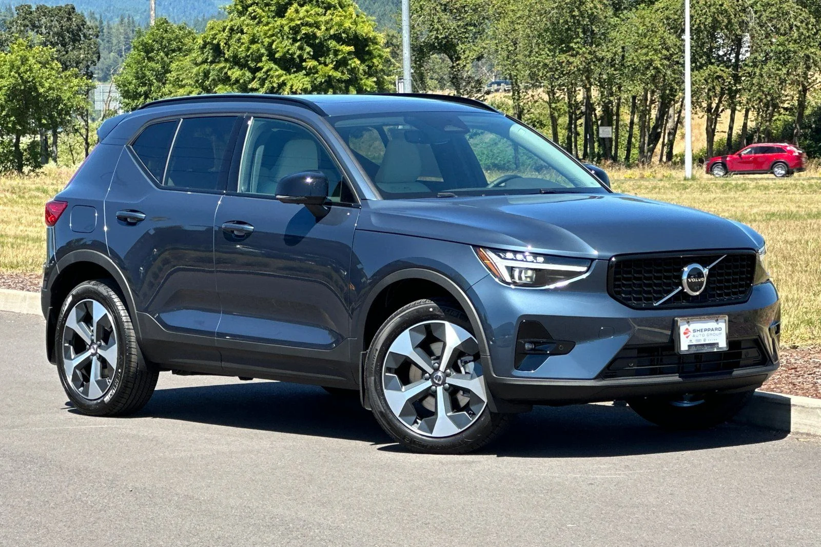 New 2026 Denim Blue Volvo Plus image 1