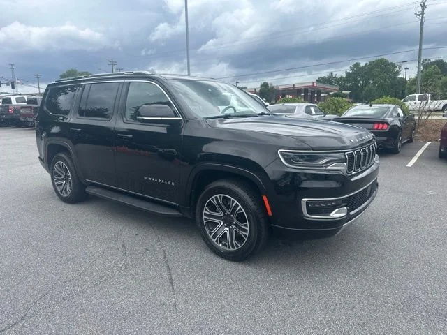 Used 2024 Black Jeep Series II image 1