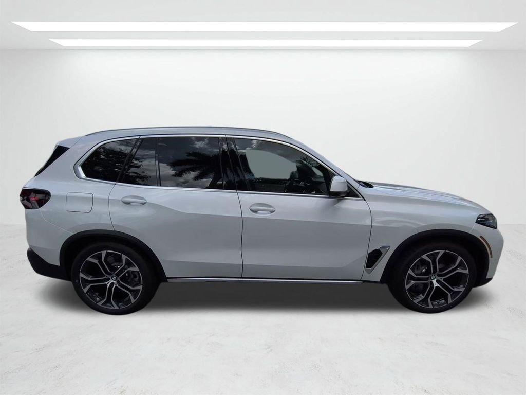 New 2026 Mineral White Metallic BMW xDrive50e image 3