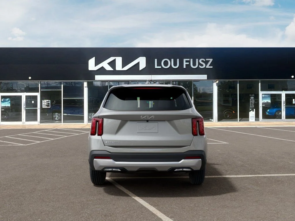 New 2026 Ivory Silver Kia LX image 5