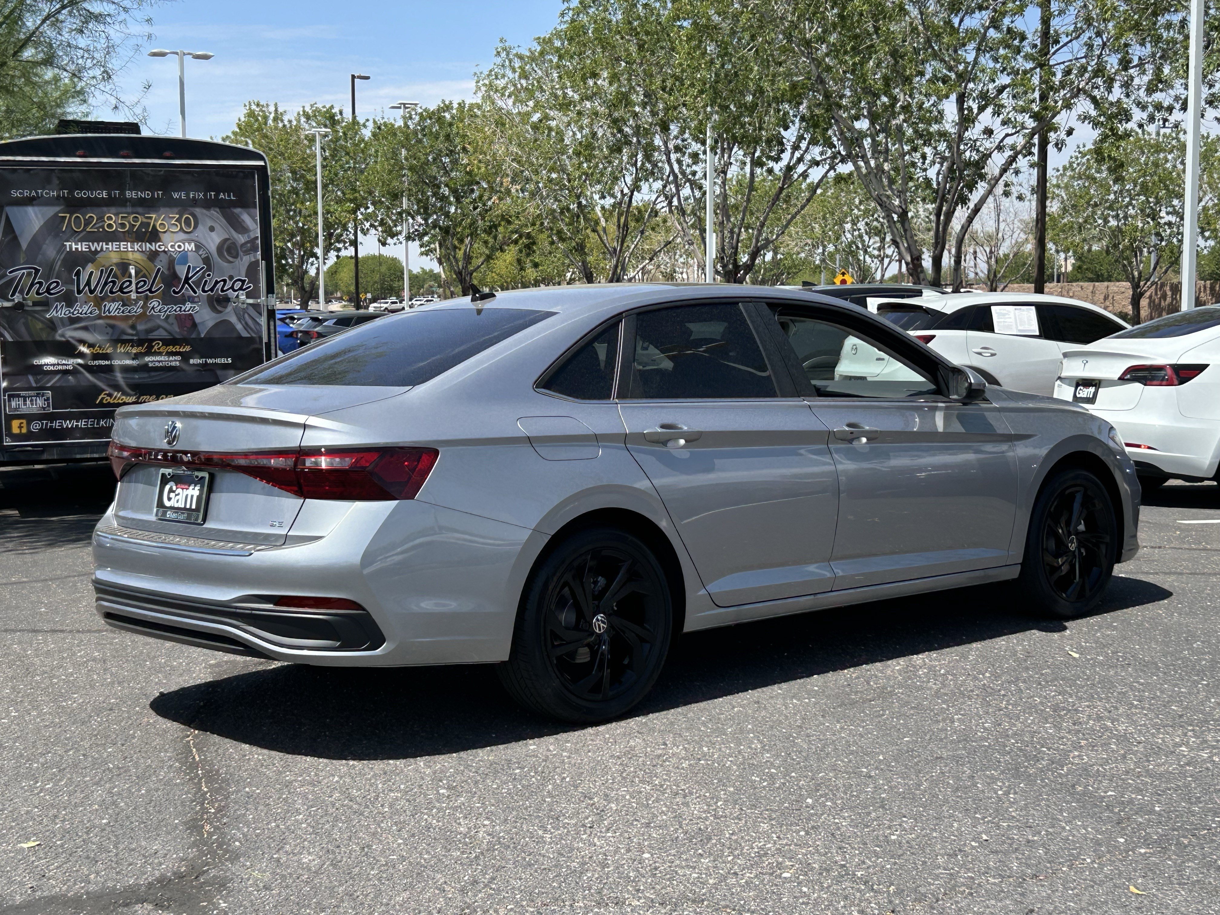 New 2026 Pyrite Silver Metallic Volkswagen SE image 3