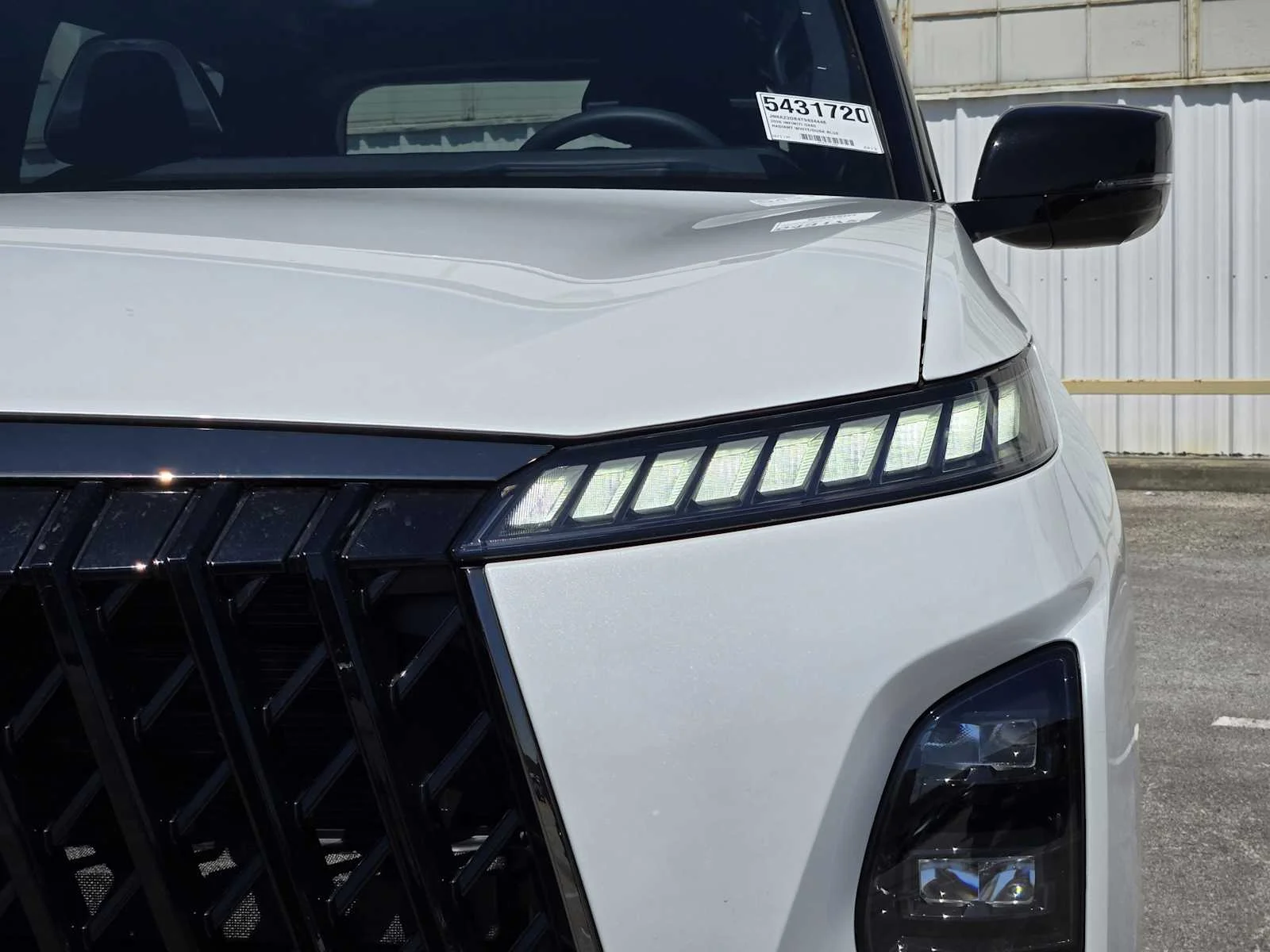 New 2026 RADIANT WHITE INFINITI Sport 4WD image 5