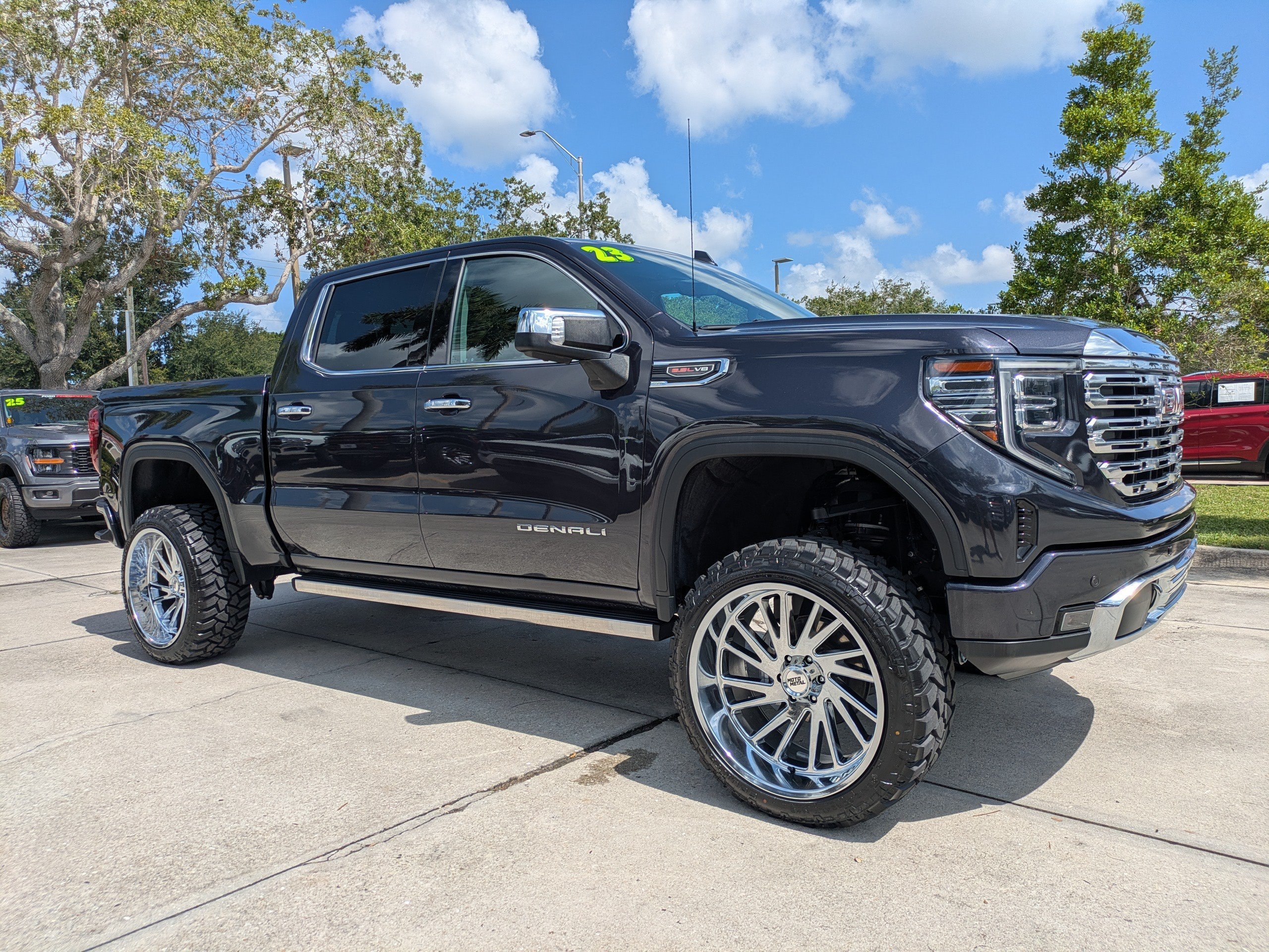 Used 2023 Titanium Rush Metallic GMC Denali image 1