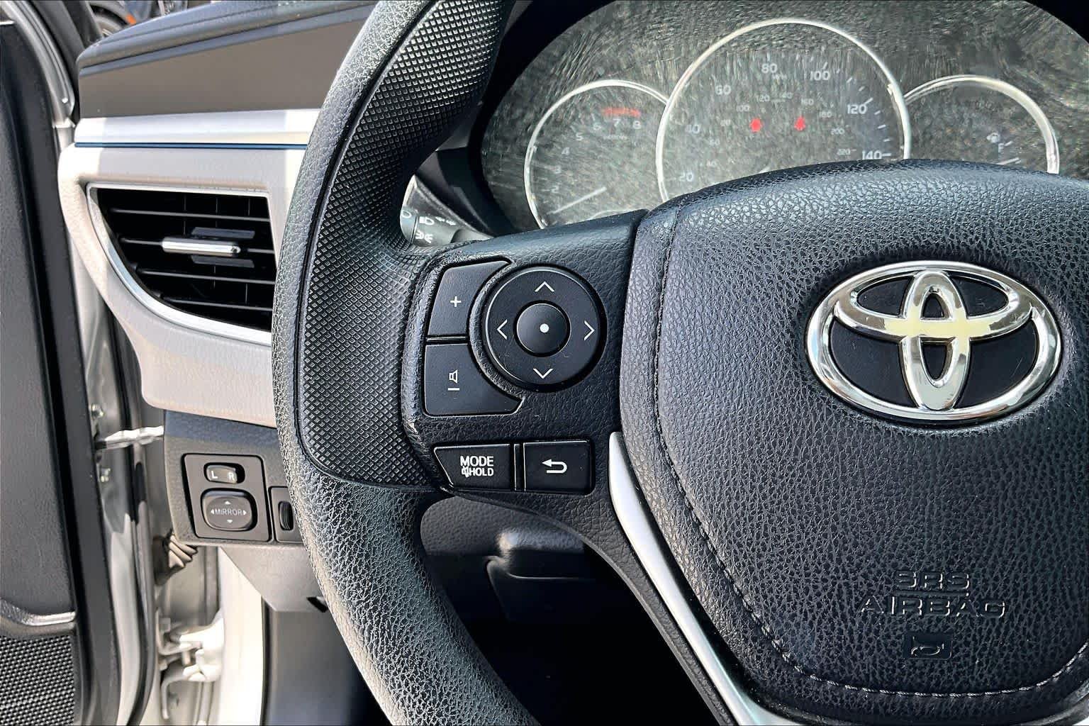 Used 2016 Classic Silver Metallic Toyota LE image 21