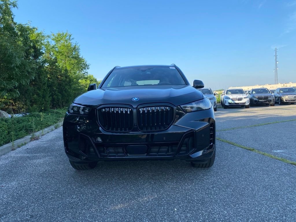 New 2026 Black Sapphire Metallic BMW xDrive50e image 2