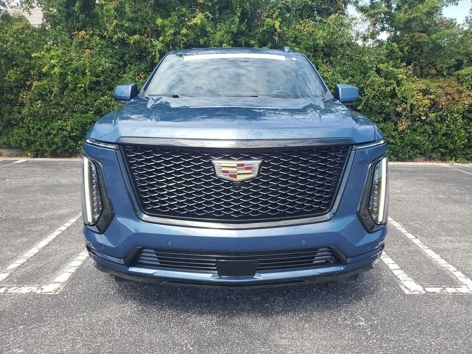 Used 2025 Deep Sea Metallic Cadillac Sport image 8
