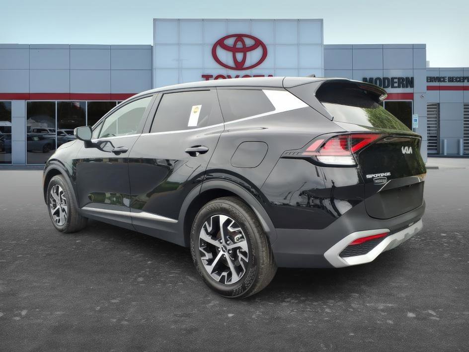 Used 2025 Ebony Black Kia EX image 3