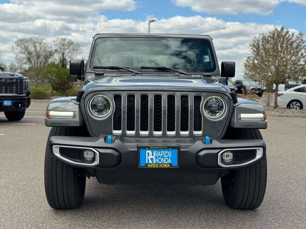 Used 2023 Jeep Wrangler 4xe Sahara 4XE with VIN 1C4JJXP64PW513361 for sale in Coon Rapids, Minnesota
